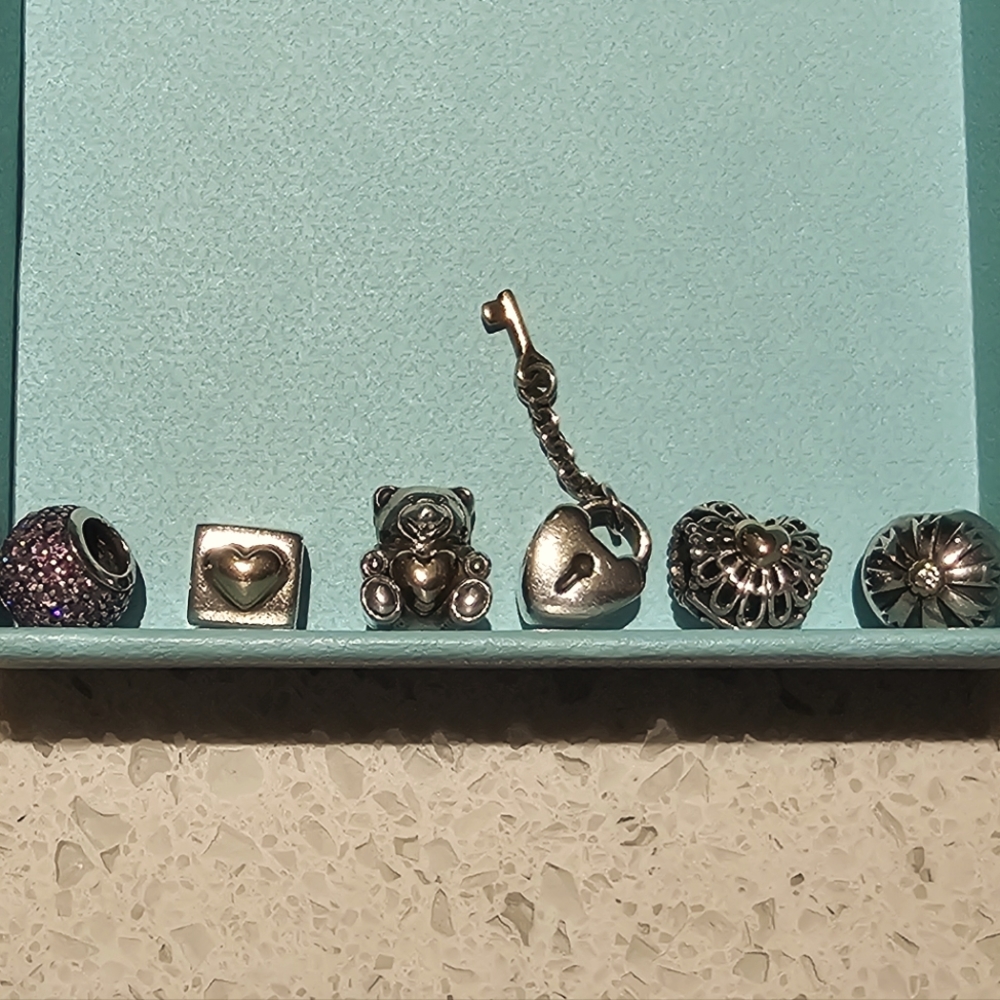 Authentic Pandora 2 tone silver and gold limited edition, retired, rare charms